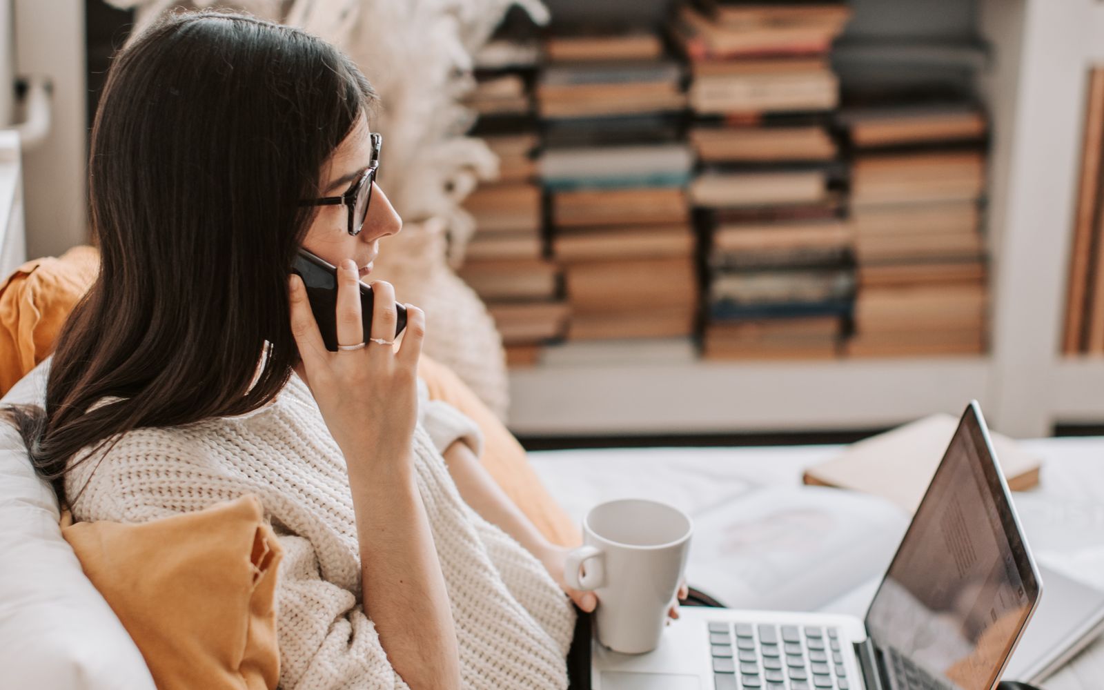 A customer booking a nail appointment on the Zenvee app at home.