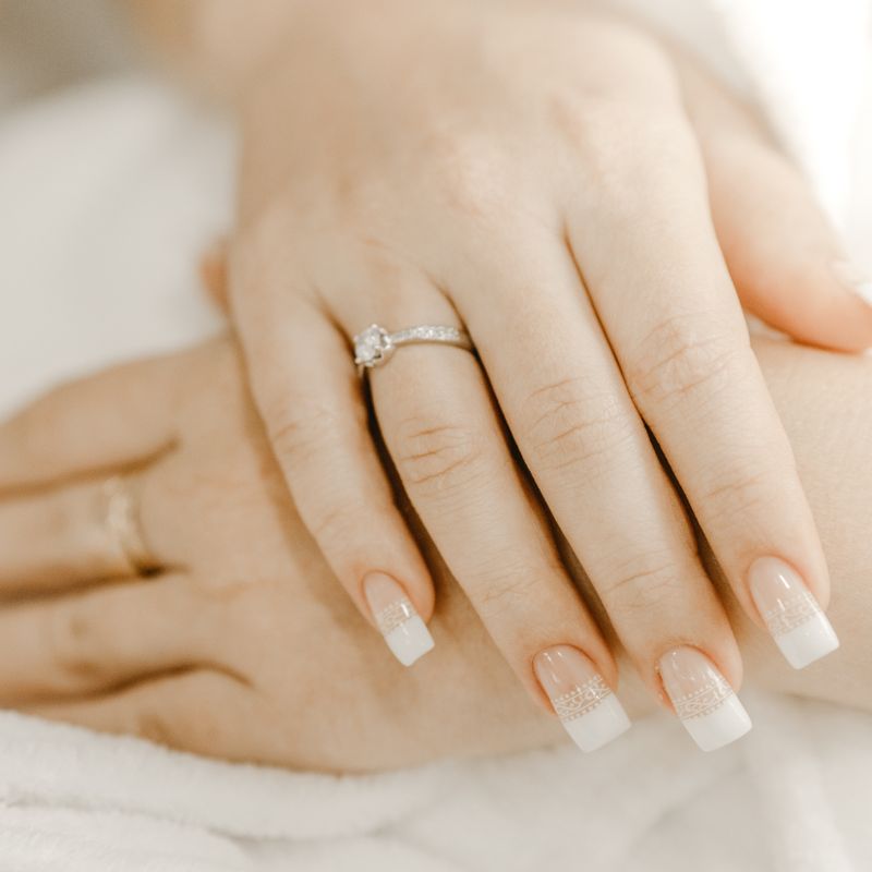 Close-up of an elegant bridal nail set.